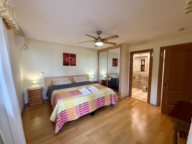 Master bedroom with ensuite and access to terrace